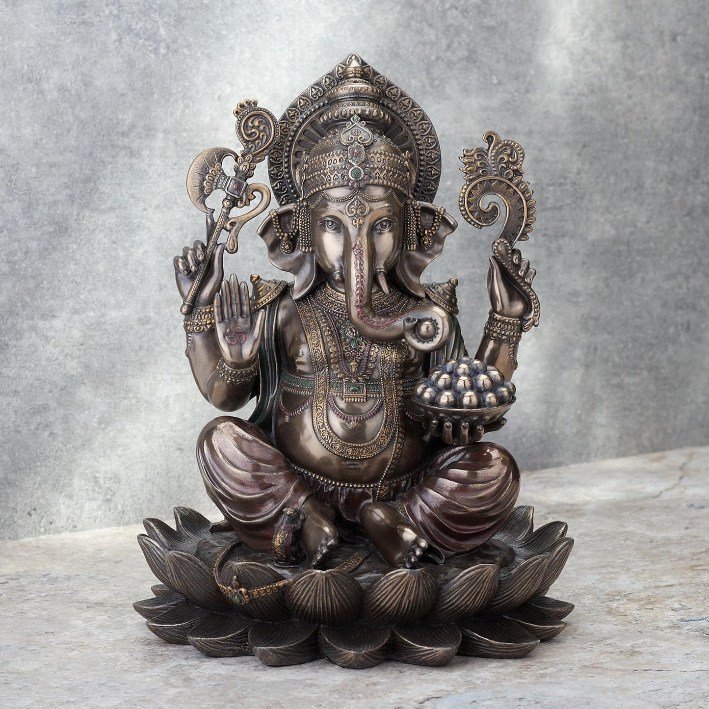 Veronese Design Bronze Finish Ganesha Seated On Lotus Holding Sacred Objects Statue