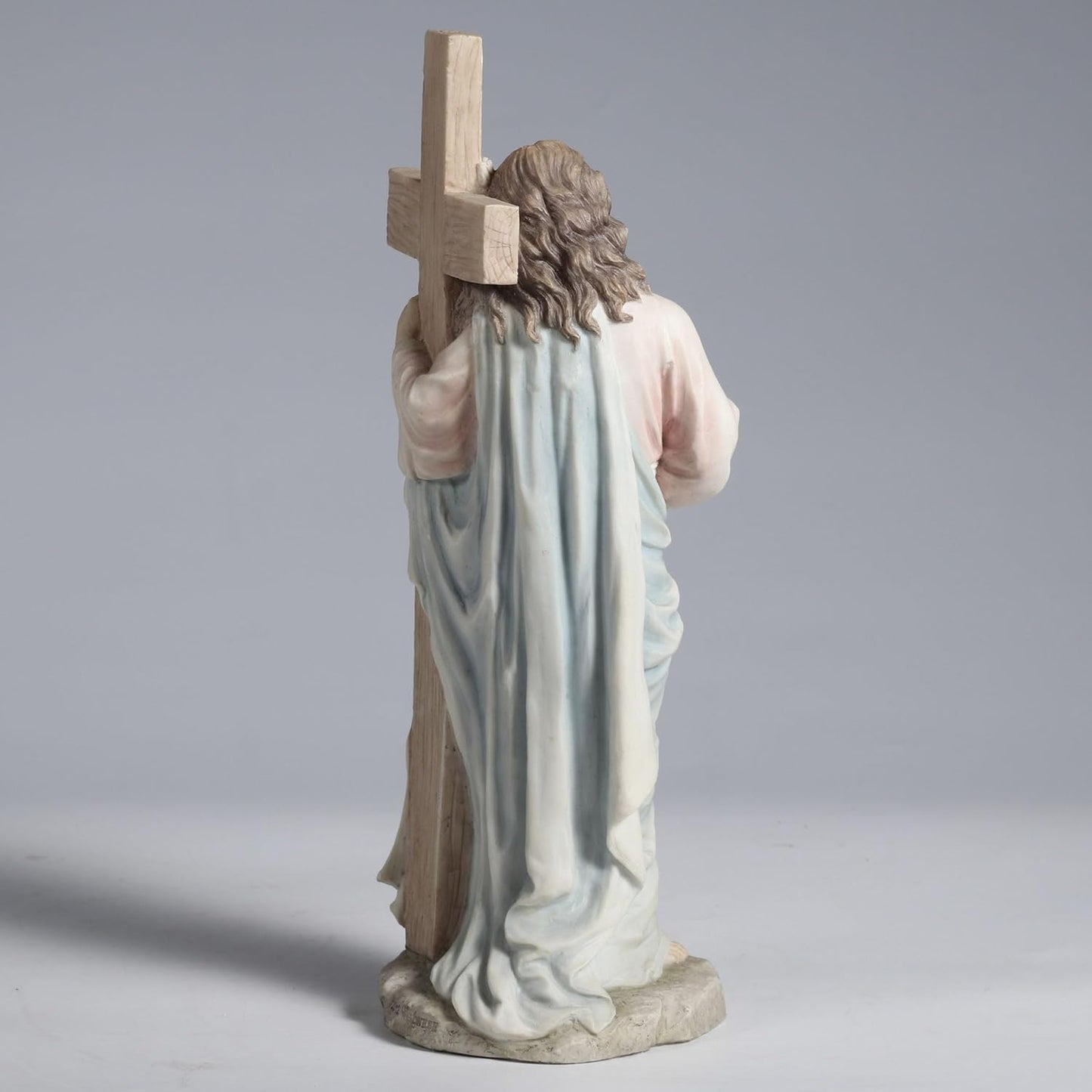11.25" Jesus with Sacred Heart Leaning on The Dove Cross Figurine