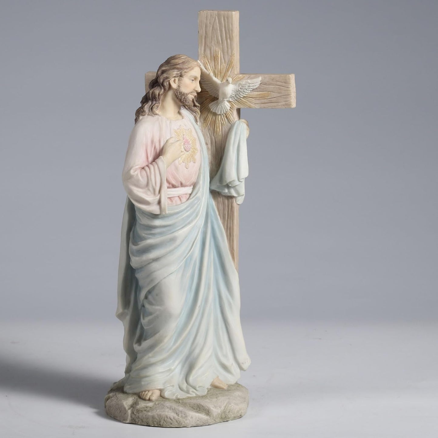 11.25" Jesus with Sacred Heart Leaning on The Dove Cross Figurine